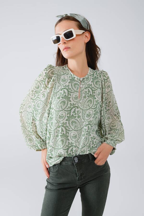 Blusa de gasa verde con estampado floral y mangas globo largas